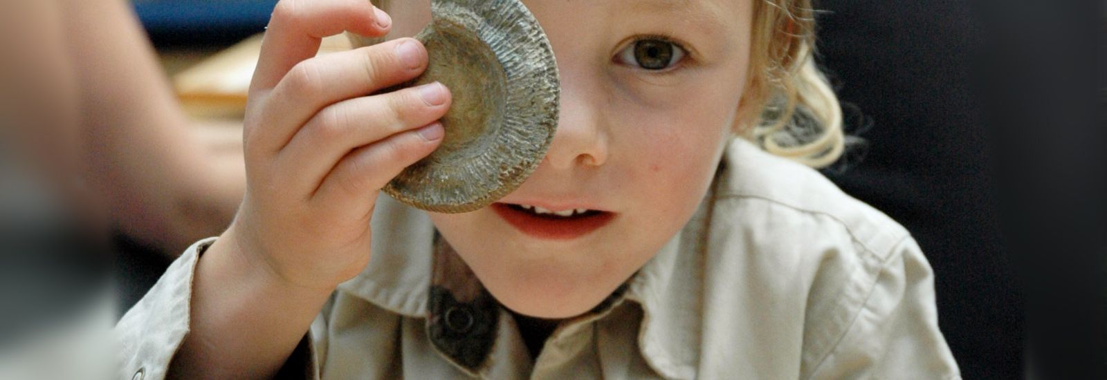 little boy with fossil